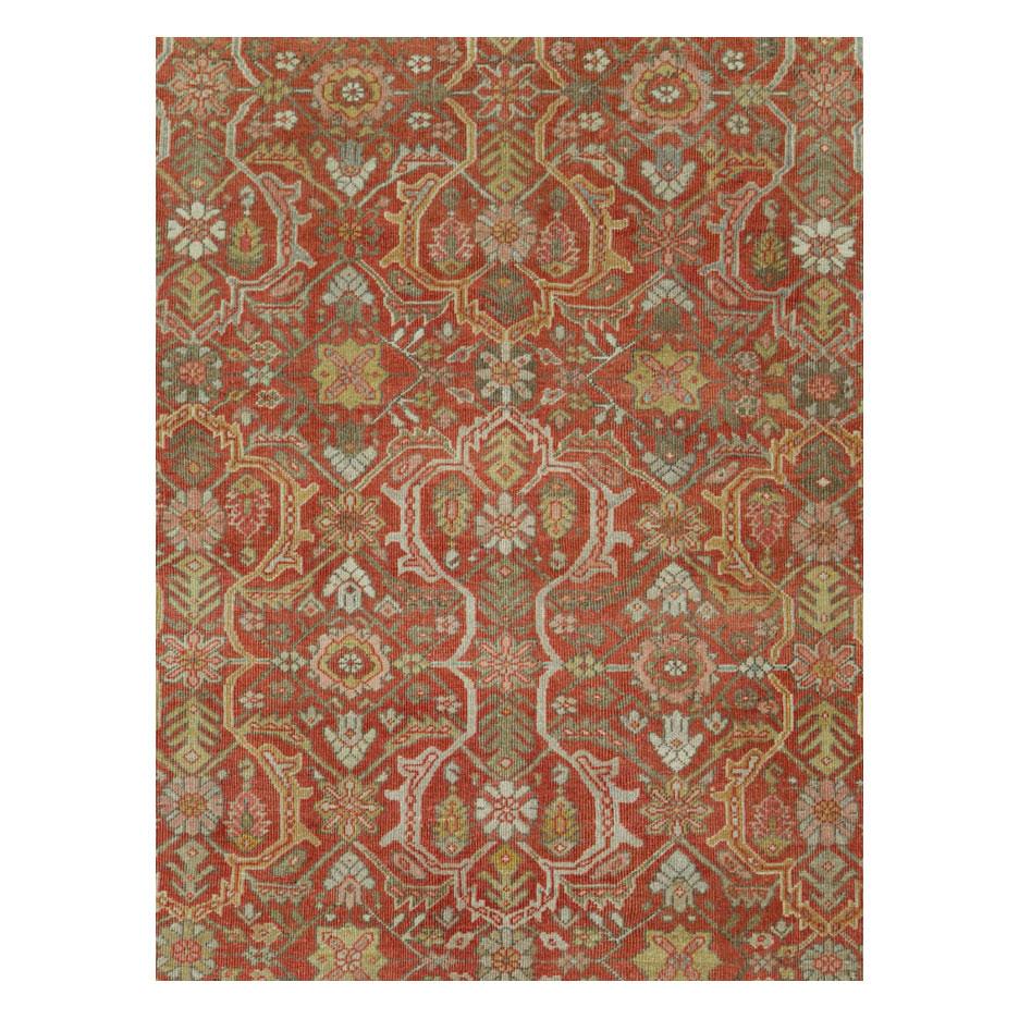 An antique Persian Mahal room size carpet handmade during the early 20th century.

Measures: 8' 4