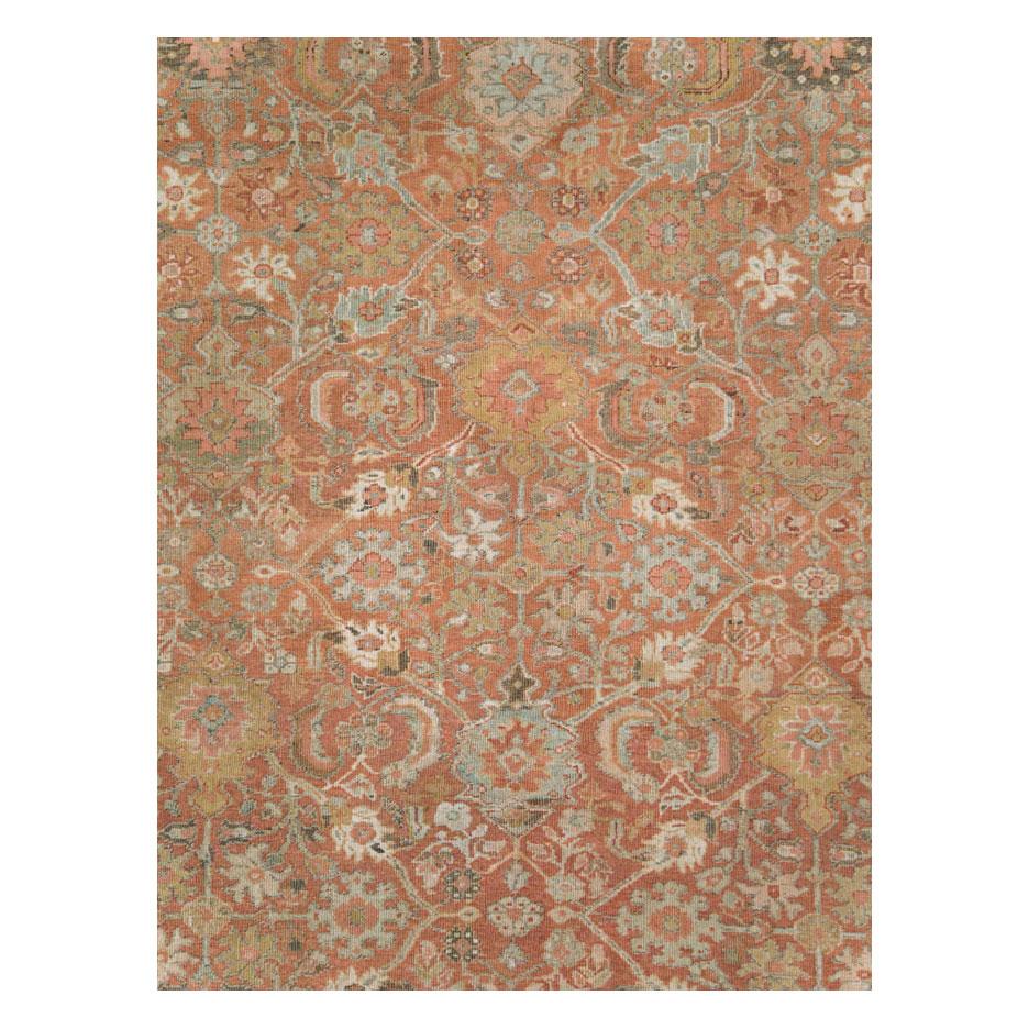 An antique Persian Mahal room size carpet handmade during the early 20th century.

Measures: 9' 1