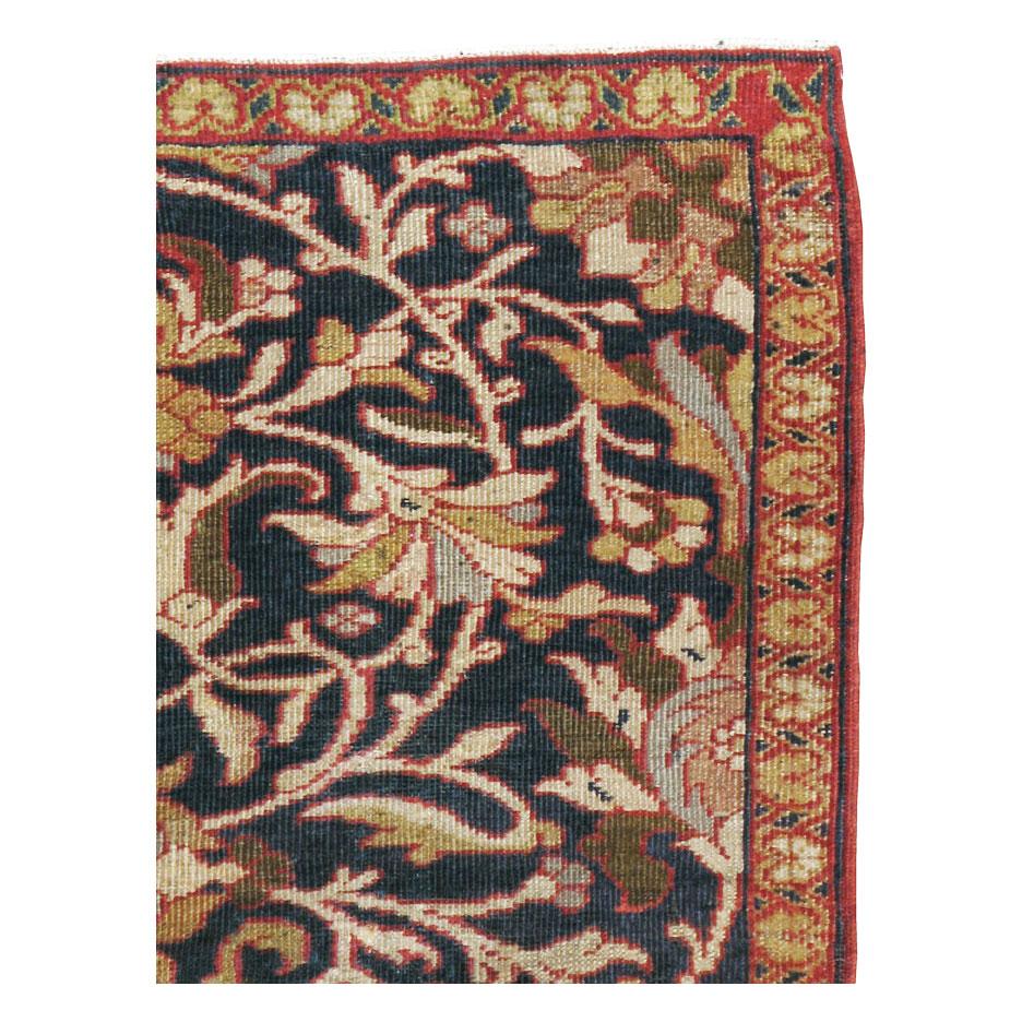 An antique Persian Wagireh (Sampler) Mahal throw rug handmade during the early 20th century. This charming ruglet was originally used as a visual sampler to weave larger carpets.

Measures: 3' 9