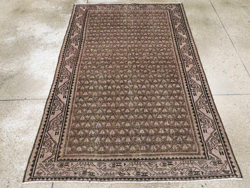 An antique Persian Malayer accent rug handmade during the early 20th century.

Measures: 4' 2