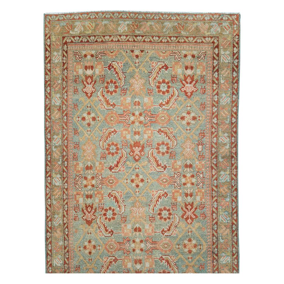 An antique Persian Malayer rug in runner format handmade during the early 20th century.

Measures: 3' 2