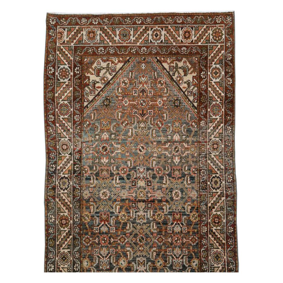 An antique Persian Malayer rug in runner format handmade during the early 20th century.

Measures: 3' 3