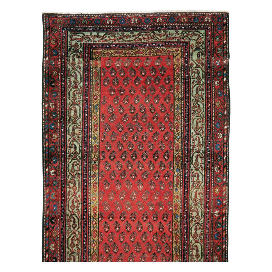 An antique Persian Malayer runner handmade during the early 20th century.

Measures: 3' 0