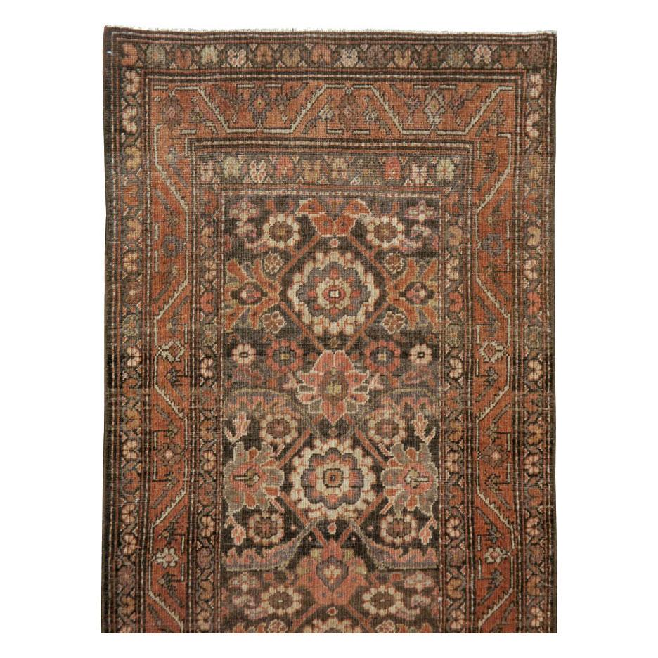 An antique Persian Malayer runner handmade during the early 20th century.

Measures: 3' 1