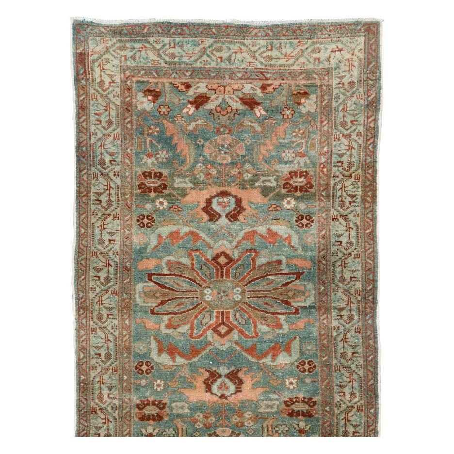 An antique Persian Malayer runner handmade during the early 20th century.

Measures: 2' 8