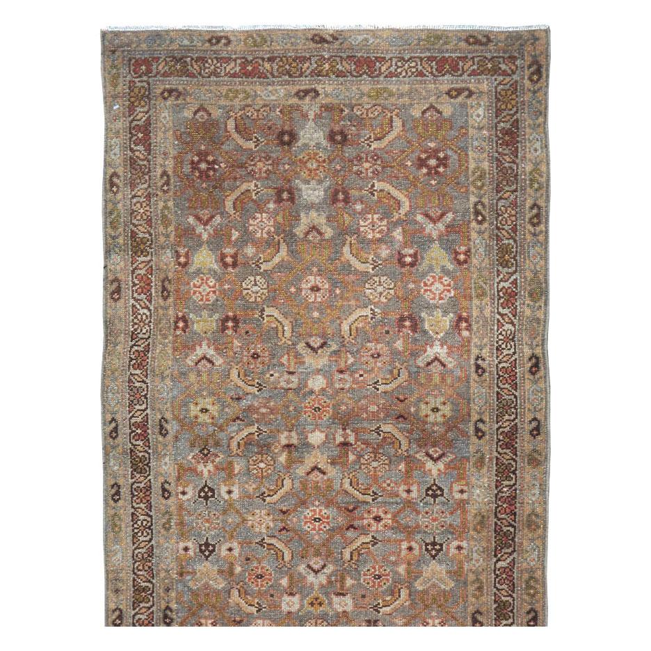 An antique Persian Malayer small runner handmade during the early 20th century.

Measures: 2' 6