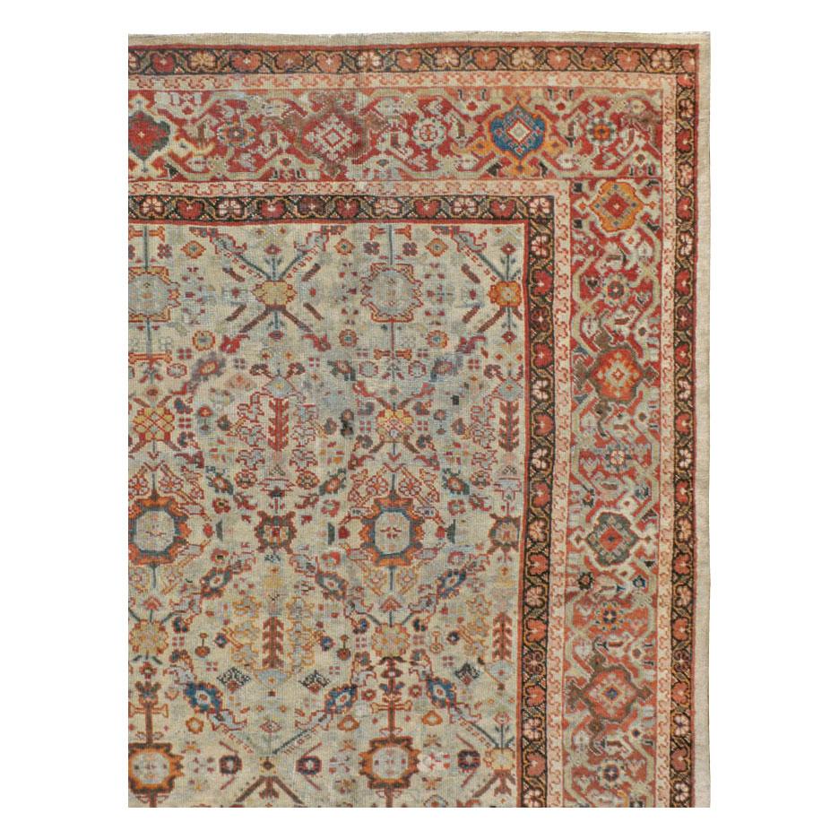 Rustic Early 20th Century Handmade Persian Room Size Rug in Light Grey, Beige, and Rust