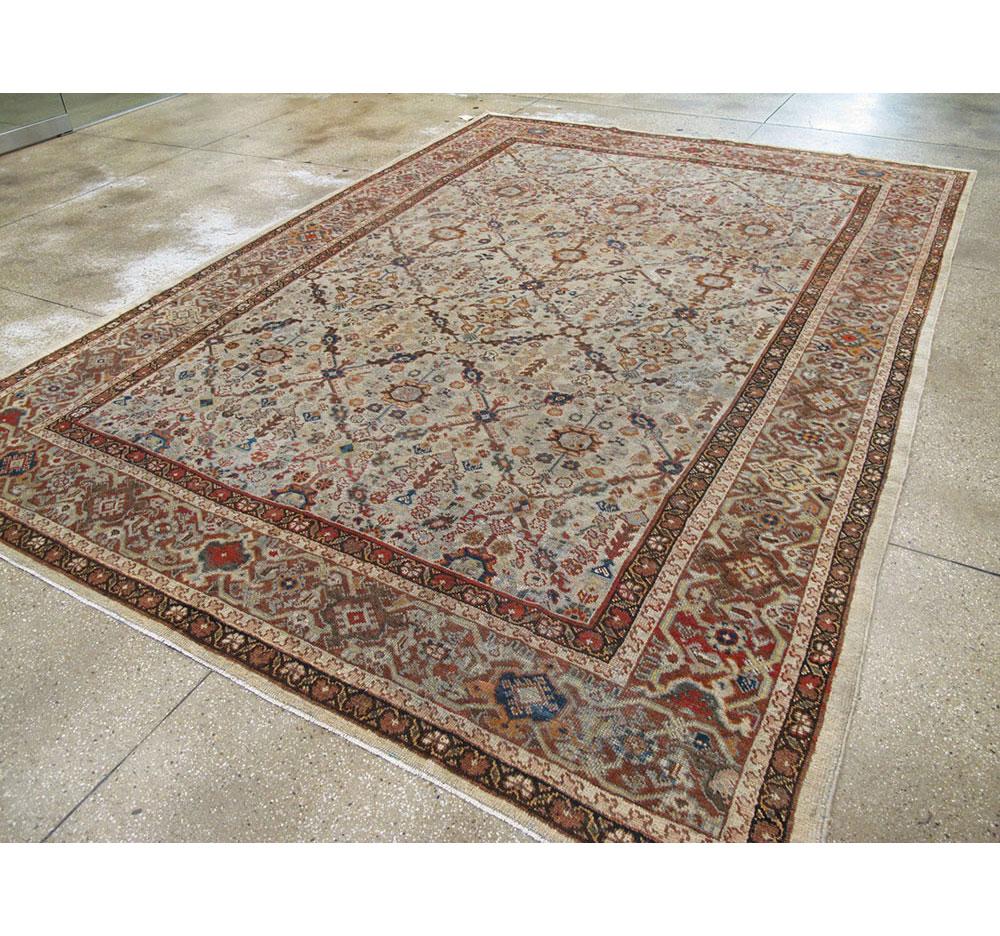 Early 20th Century Handmade Persian Room Size Rug in Light Grey, Beige, and Rust In Good Condition In New York, NY