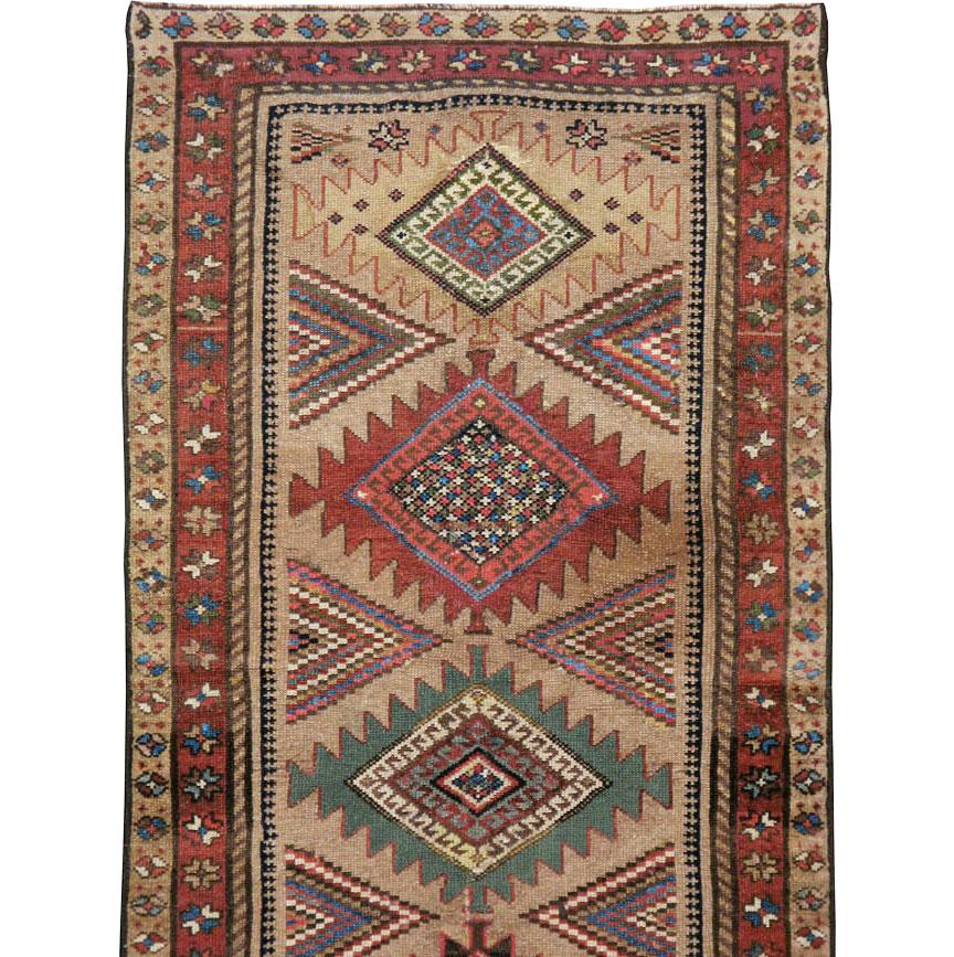 Folk Art Early 20th Century Handmade Persian Runner with Brown, Green, and Rust Tones For Sale