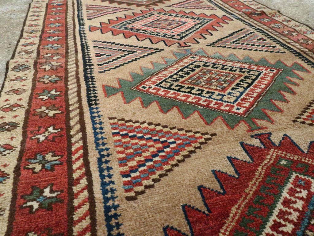 Early 20th Century Handmade Persian Runner with Brown, Green, and Rust Tones In Good Condition For Sale In New York, NY