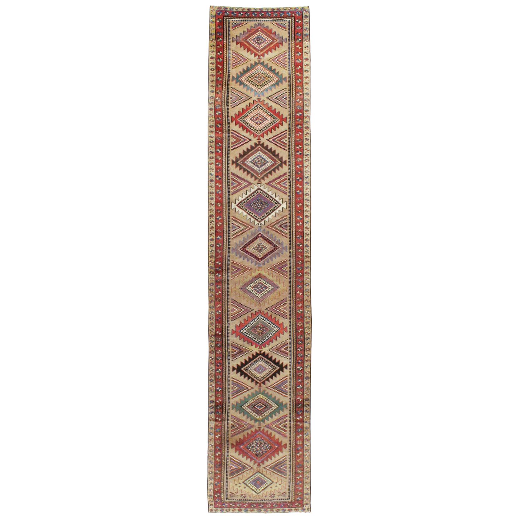 Early 20th Century Handmade Persian Runner with Brown, Green, and Rust Tones For Sale