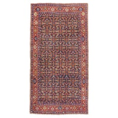 Antique Early 20th Century Handmade Persian Rustic Gallery Accent Rug in Red and Blue