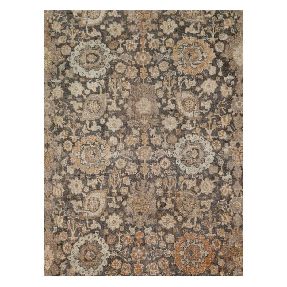 An antique Persian rustic Tabriz small room size carpet handmade during the early 20th century.

Measures: 7' 8