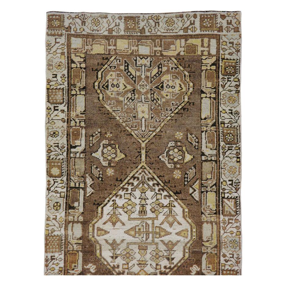 An antique Persian Serab runner handmade during the early 20th century.

Measures: 3' 1