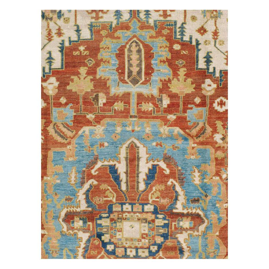 An antique Persian Serapi (grade term for higher quality Heriz rugs) large room size carpet handmade during the early 20th century.

Measures: 11' 10