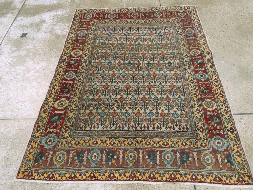 Rustic Early 20th Century Handmade Persian Tabriz Accent Rug For Sale