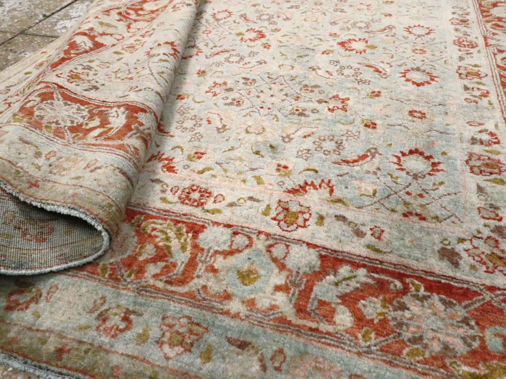 Tapis d'appoint persan Tabriz du début du 20e siècle:: fait à la main:: bleu ardoise et rouge en vente 1