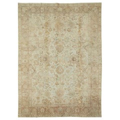 Early 20th Century Handmade Persian Tabriz Accent Rug with Muted Neutral Tones