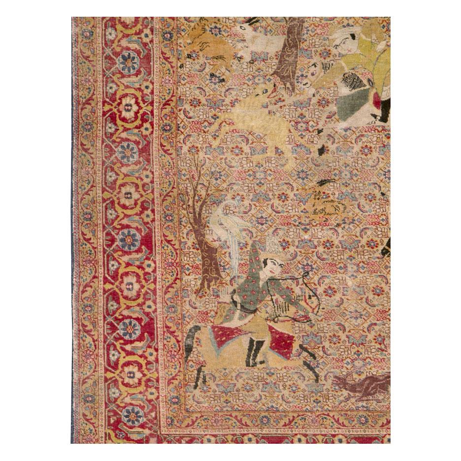 Handgefertigter persischer Täbris-Teppich mit Jagdszenen und Bildakzenten aus dem frühen 20. Jahrhundert (Persisch) im Angebot