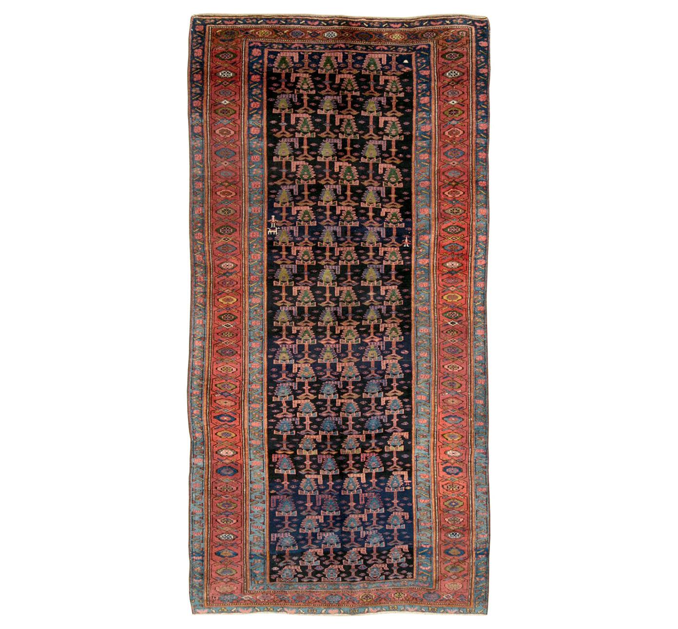 Early 20th Century Handmade Persian Tribal Gallery Accent Rug in Jewel Tones For Sale