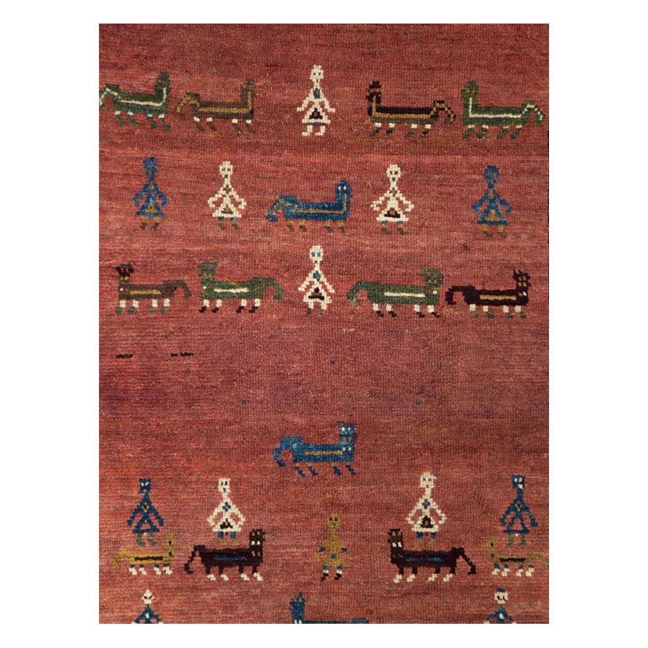 An antique Persian Pictorial tribal rug in runner format handmade by the Kurdish tribes of Persia during the early 20th century.

Measures: 3' 8