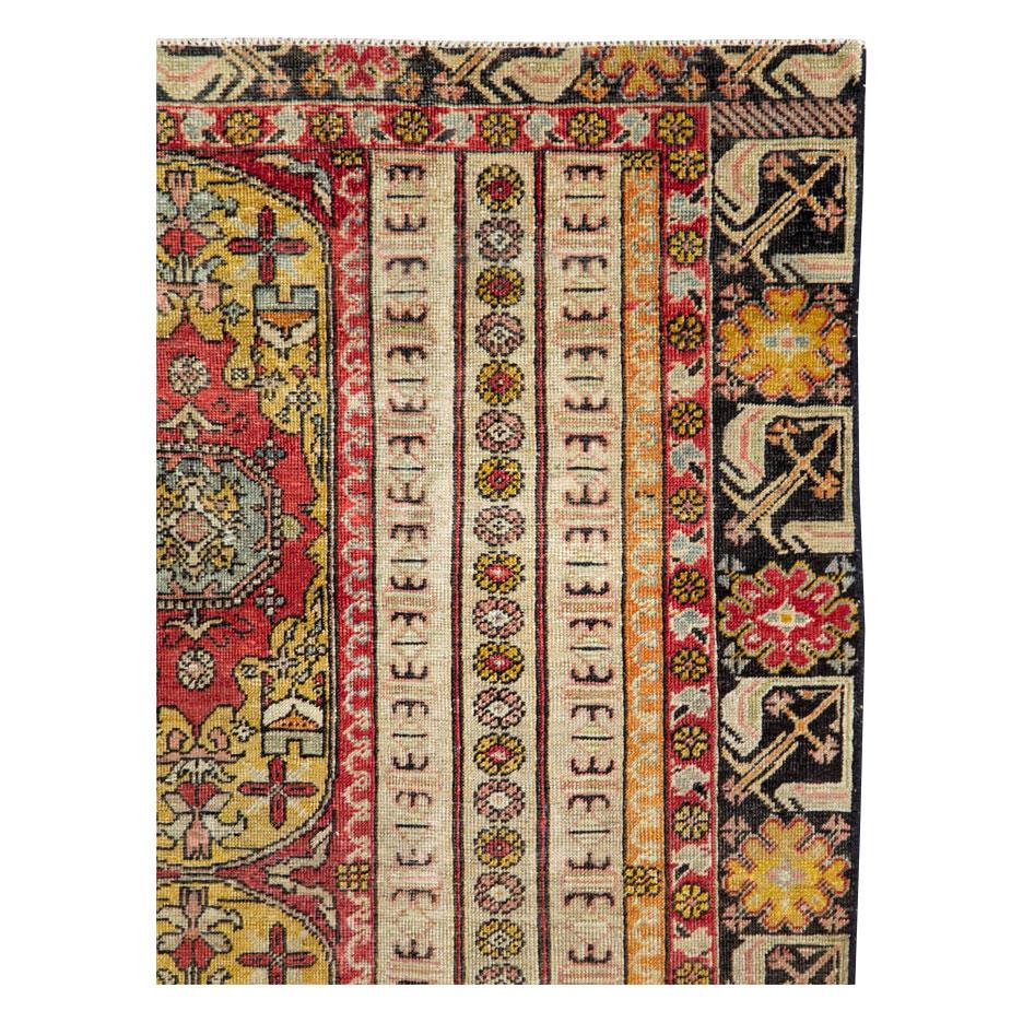 A vintage Turkish Ghiordes accent rug handmade during the early 20th century.

Measures: 4' 0