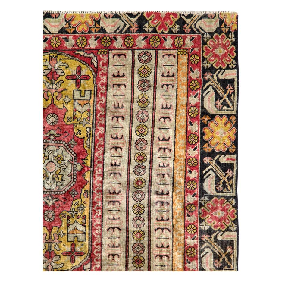 Rustic Early 20th Century Handmade Turkish Ghiordes Accent Rug For Sale