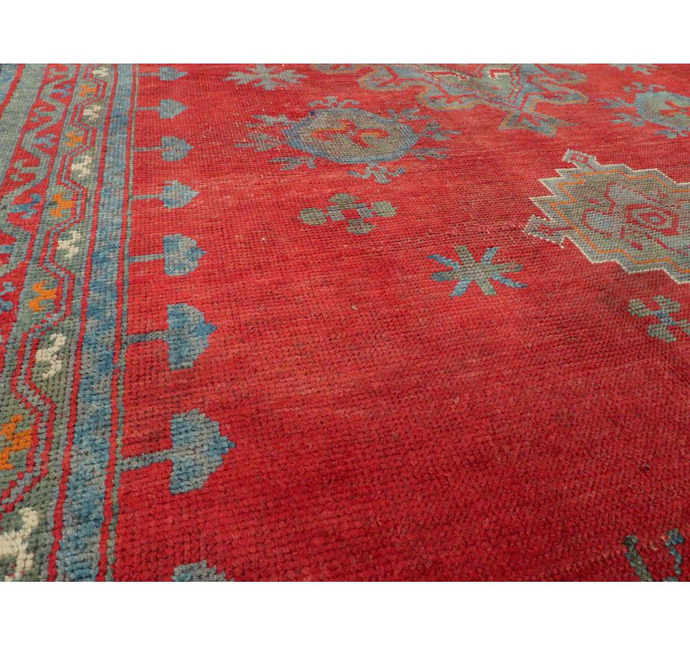 Wool Early 20th Century Handmade Turkish Oushak Gallery Rug in Red For Sale