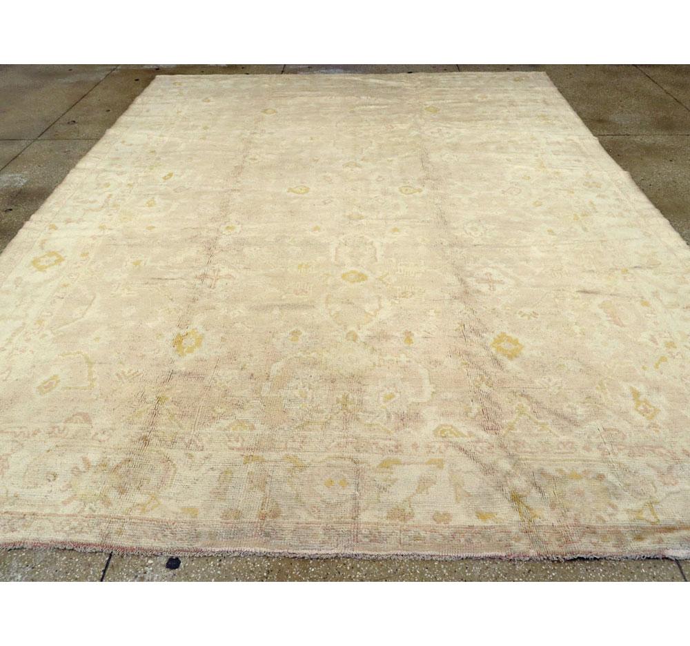 Hand-Knotted Early 20th Century Handmade Turkish Oushak Room Size Carpet For Sale