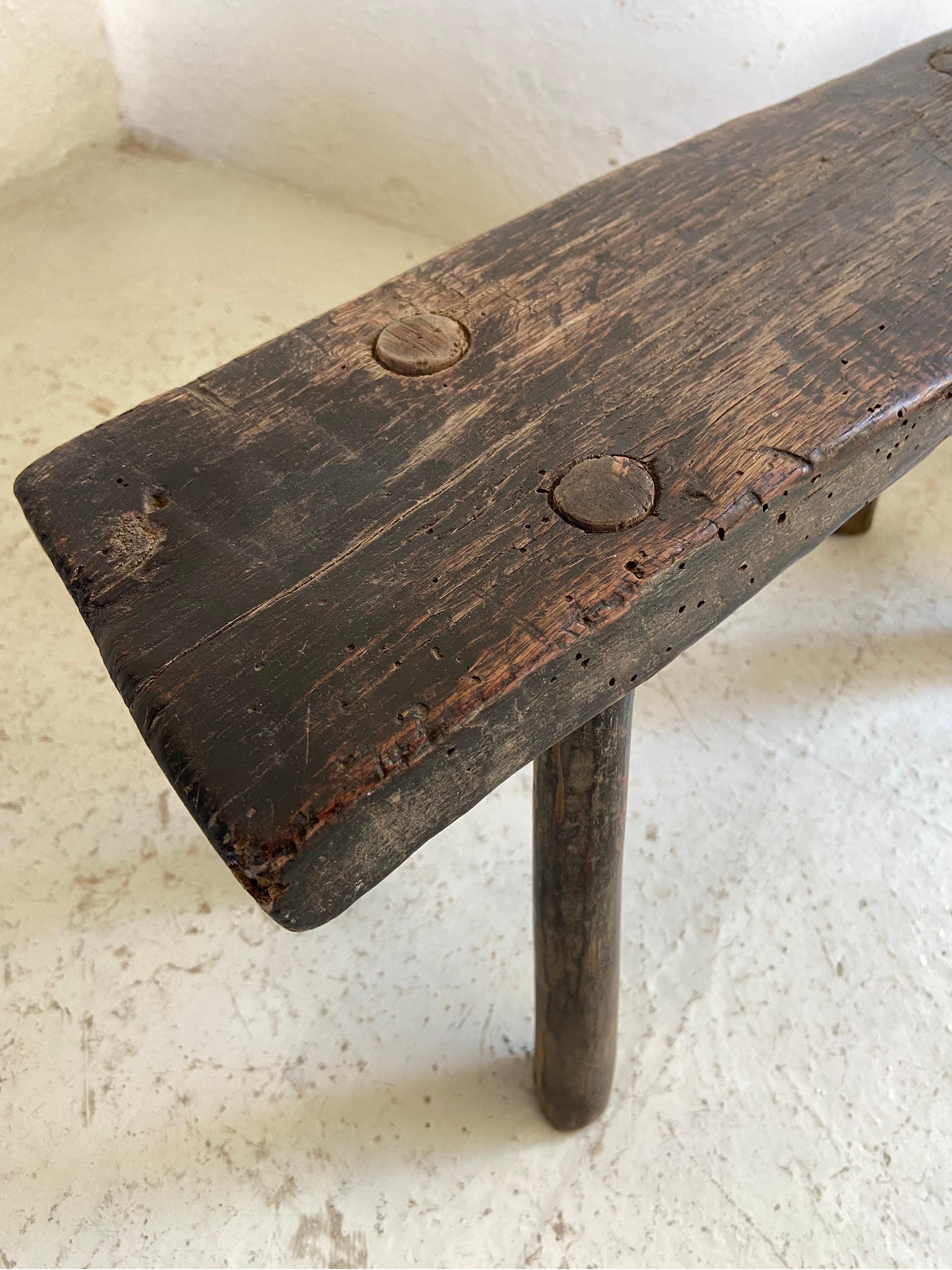 Early 20th century mesquite hardwood stool from Guanajuato, Mexico. Strong patina is evident in the photos. Legs are intact and secure. Most likely used as a work stool.