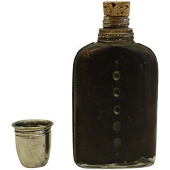 Early 20th Century Heavy Glass and Leather Flask with Silver Plated Cup