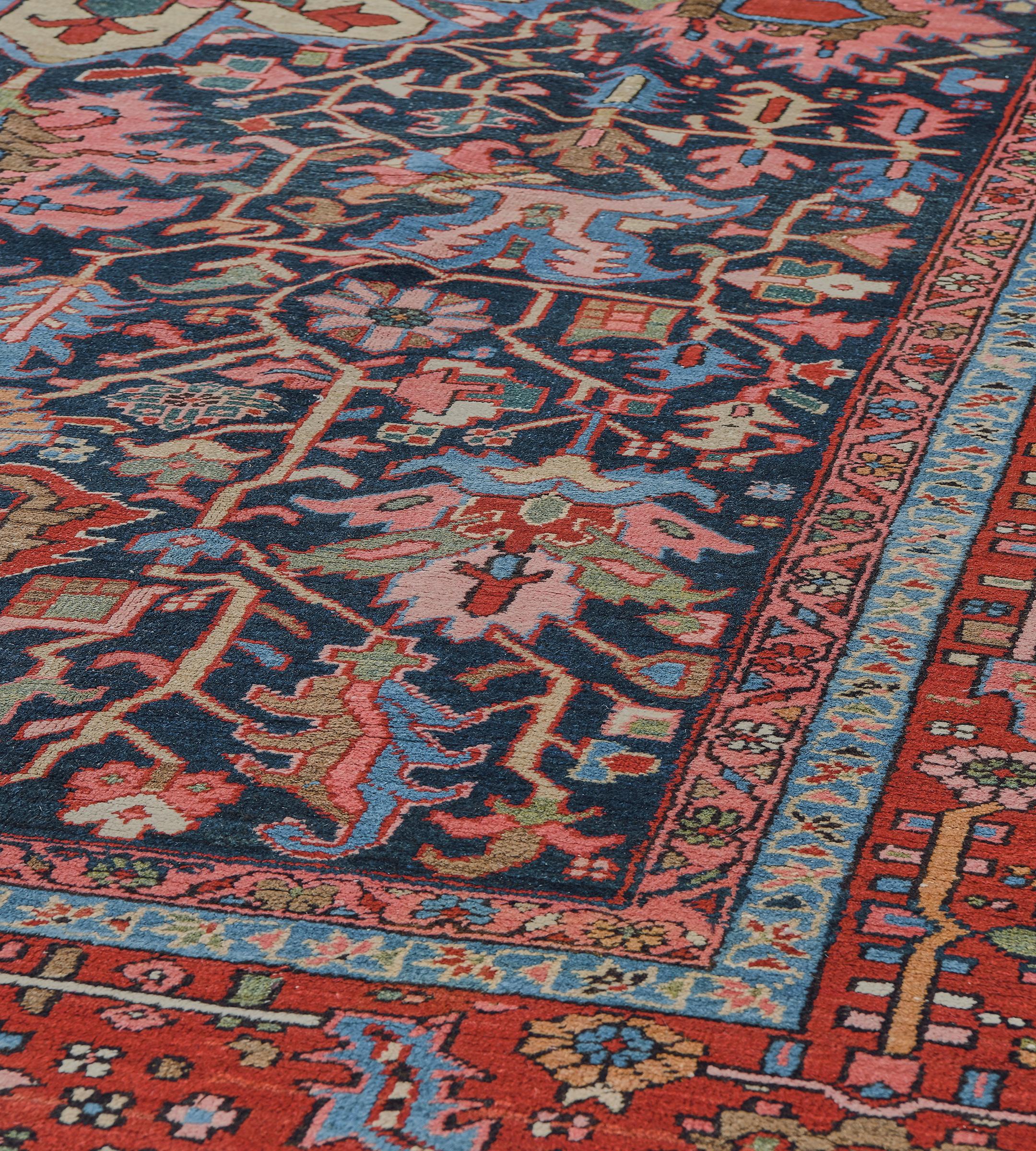 20th Century Hand-woven Traditional Red and Indigo Floral Heriz Rug from North West Persia For Sale