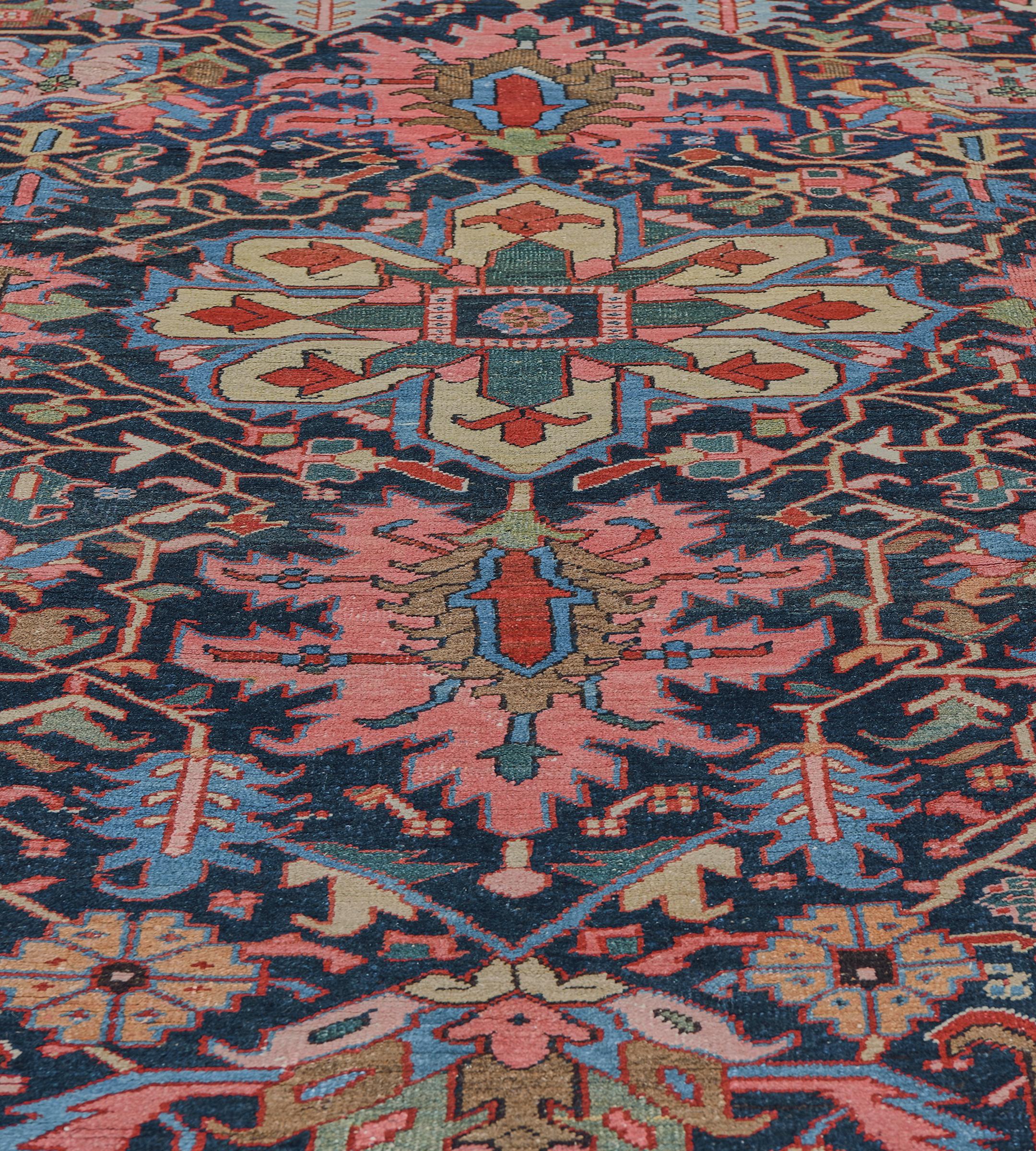 Wool Hand-woven Traditional Red and Indigo Floral Heriz Rug from North West Persia For Sale