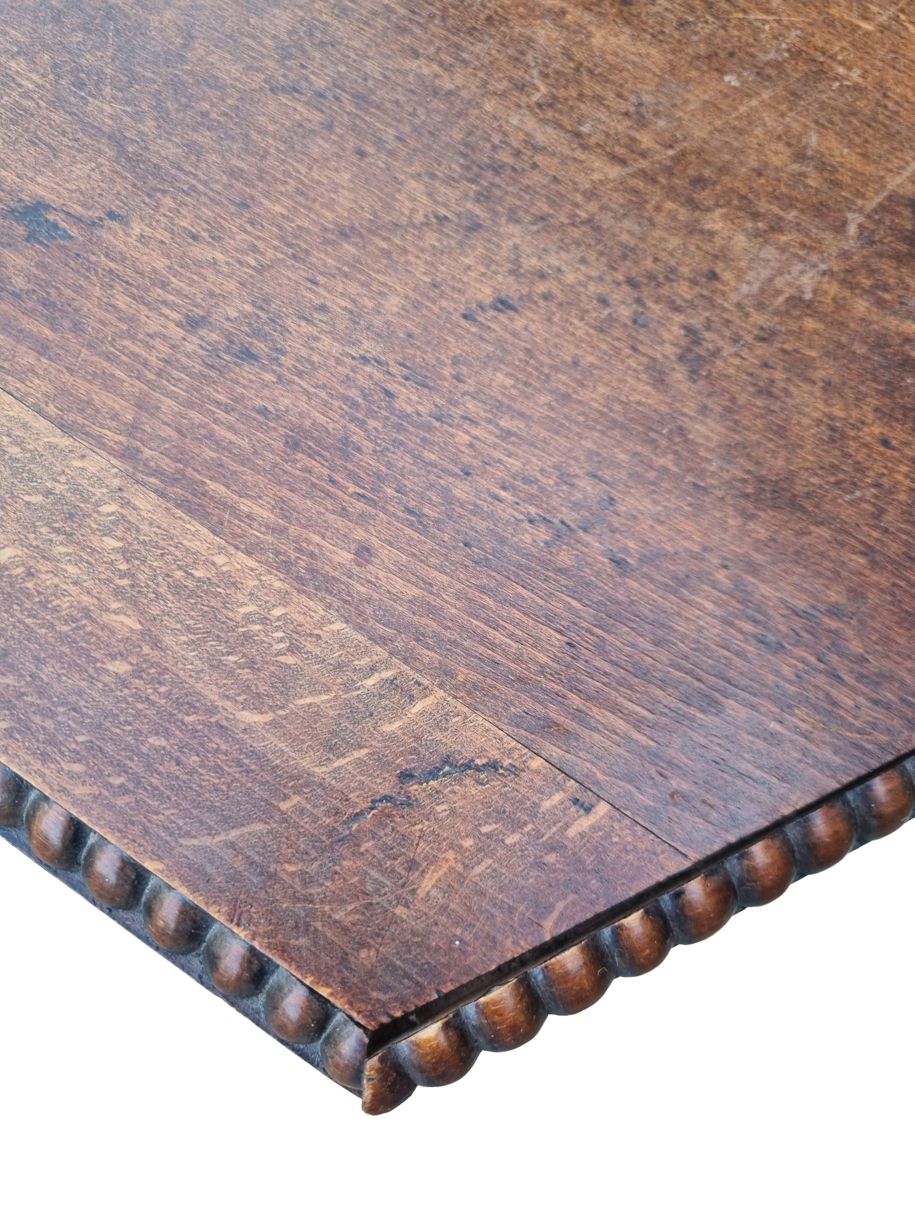 Dutch Early 20th-Century Hexagonal Oak Side Table with Bobbin (Spool) Legs & Beaded Ed For Sale