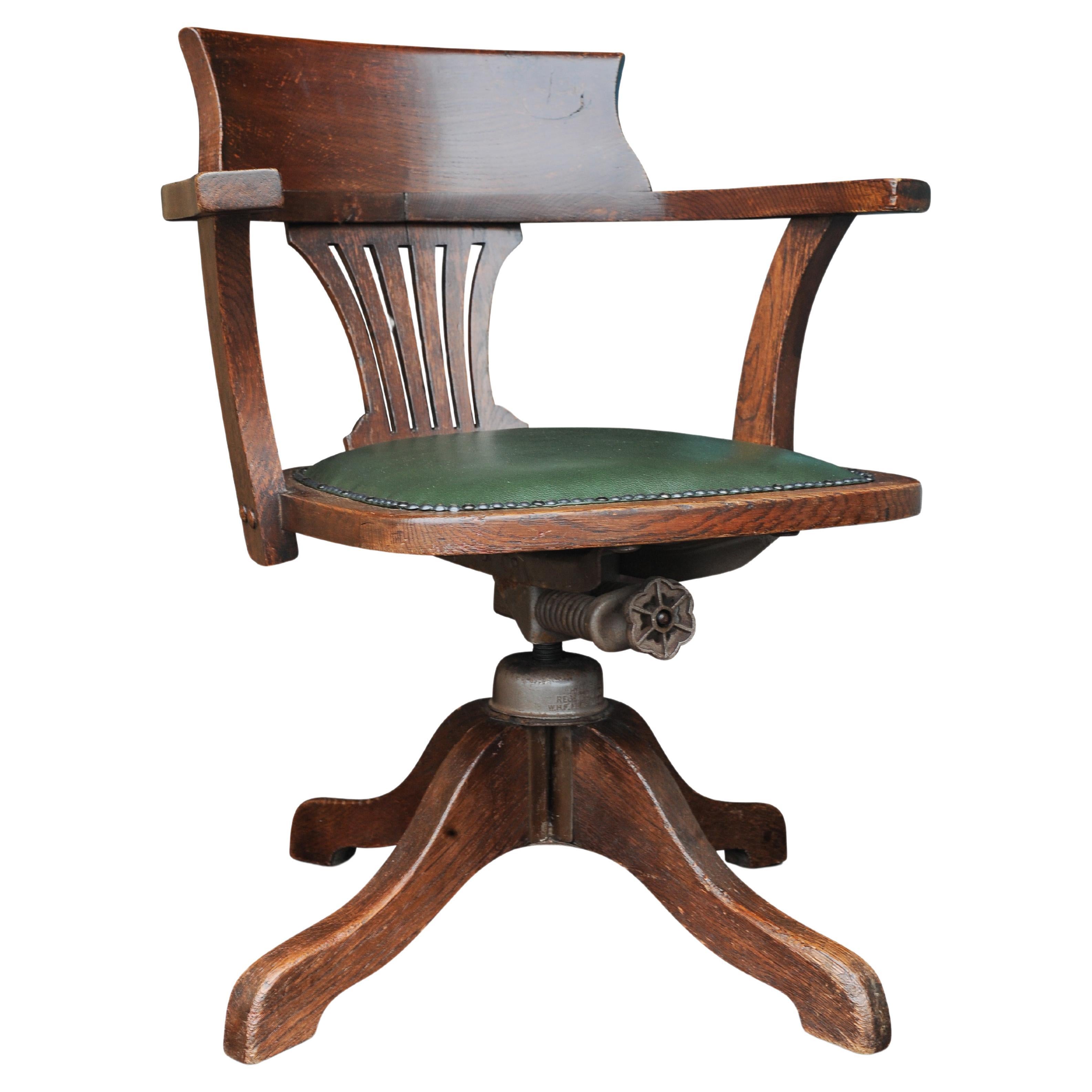 Early 20th Century Hillcrest Oak Rail Back Leather Revolving Desk Chair For Sale
