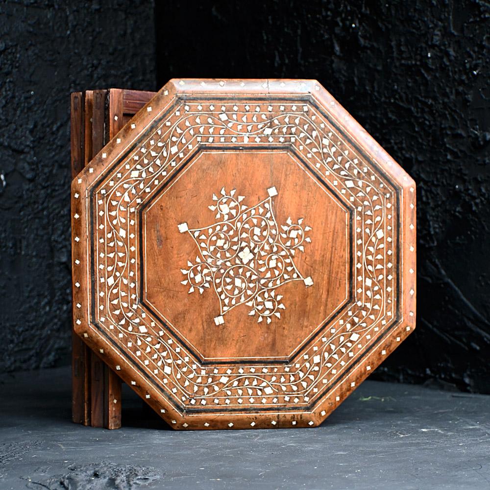 Early 20th Century Hoshiarpur Occasional Table 
 
A fine medium sized example of an early 20th century folding Hoshiarpur table. Covered in intricate patterned top detail and with folding base with brass hinges. Still has its original paper product