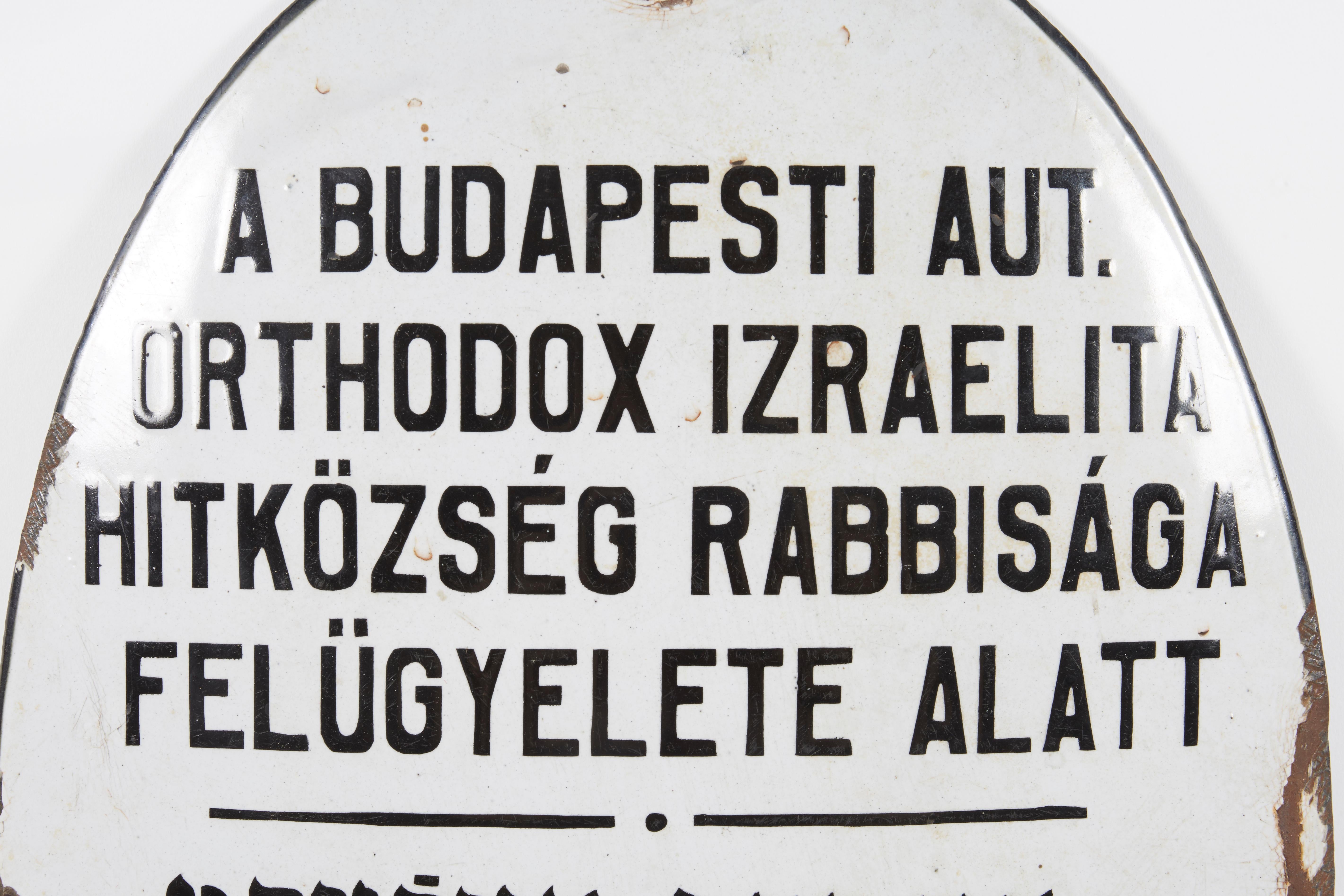 Heavy and massive enamel Kosher butcher shop sign, Budapest, Hungary, circa 1900.
White and black enamel over iron, inscribed in Hebrew and in Hungarian: 