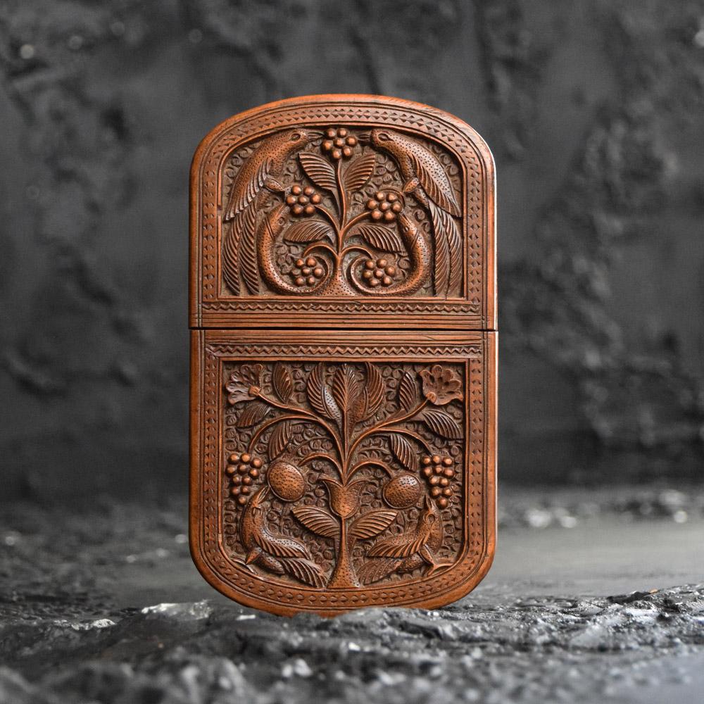 Early 20th century Indian carved cigar box 

We share what we love, and we love this intricately hand carved early 20th century Indian cigar box. Covered in ornate birds and floral foliage. With a naturally aged deep patination this box would have