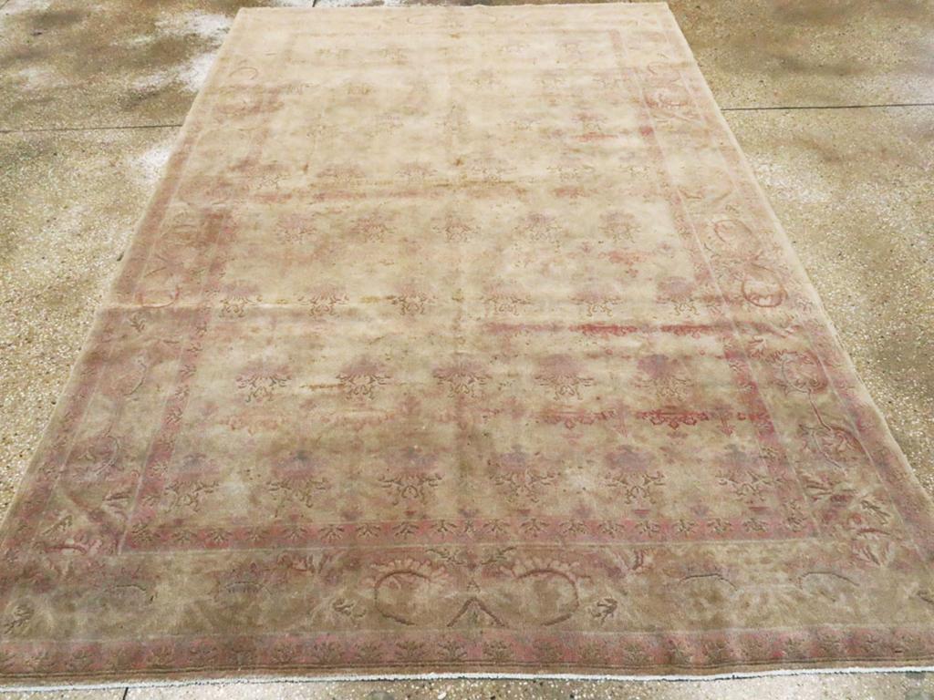 An antique Indian Lahore accent rug handmade during the Early 20th century.

Measures: 6' 3