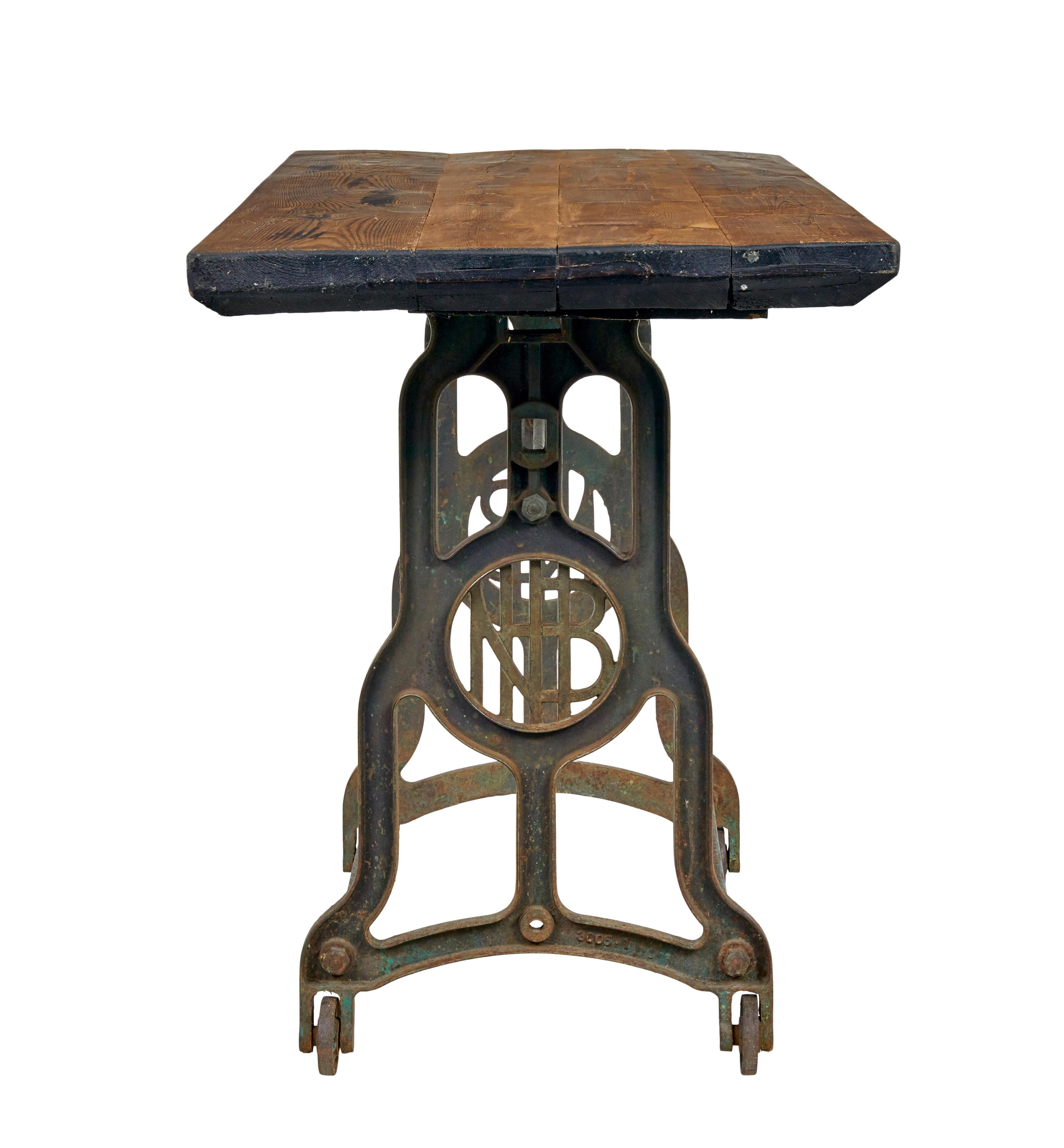 Industrial Early 20th century industrial cast iron and pine work table For Sale