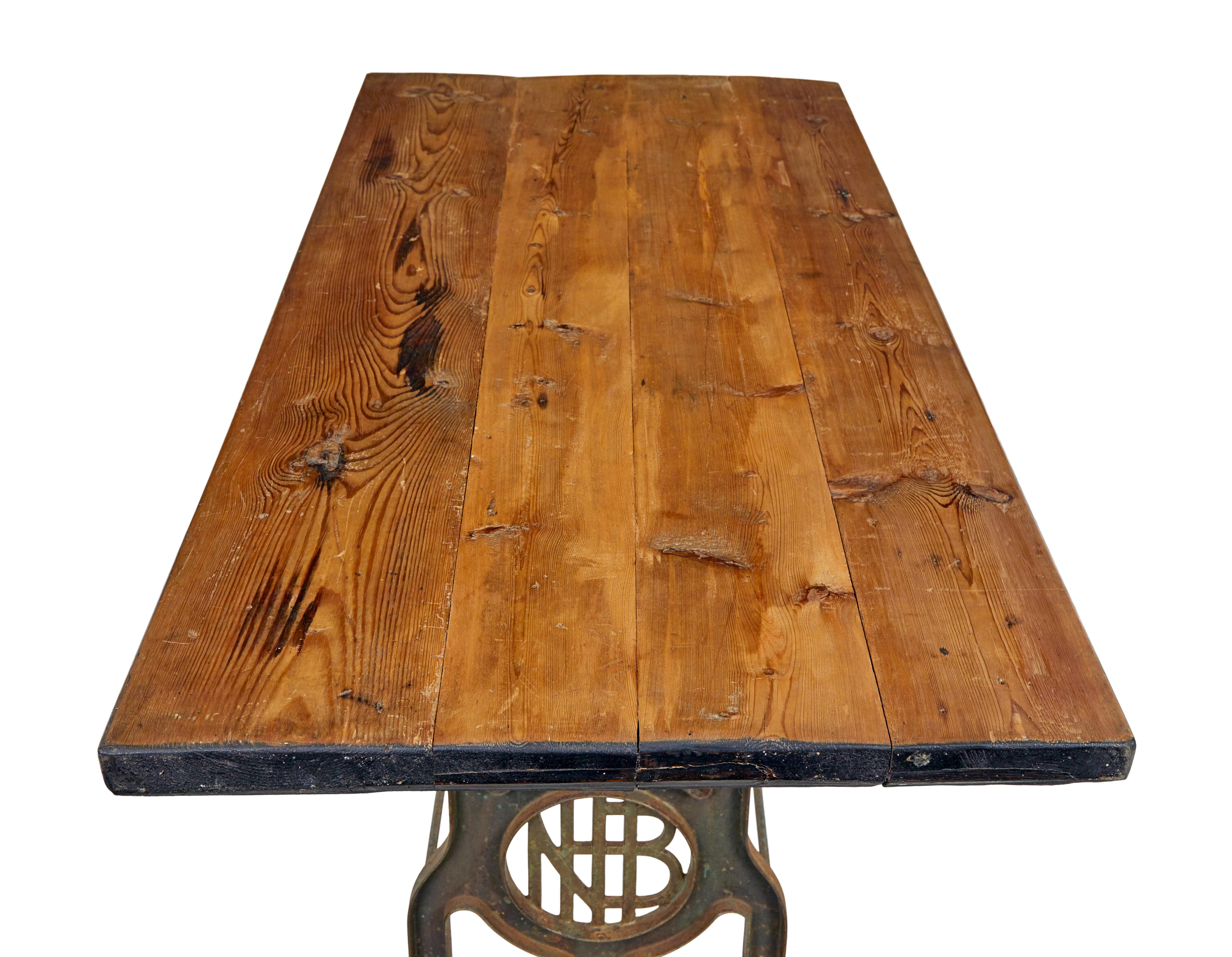 20th Century Early 20th century industrial cast iron and pine work table For Sale