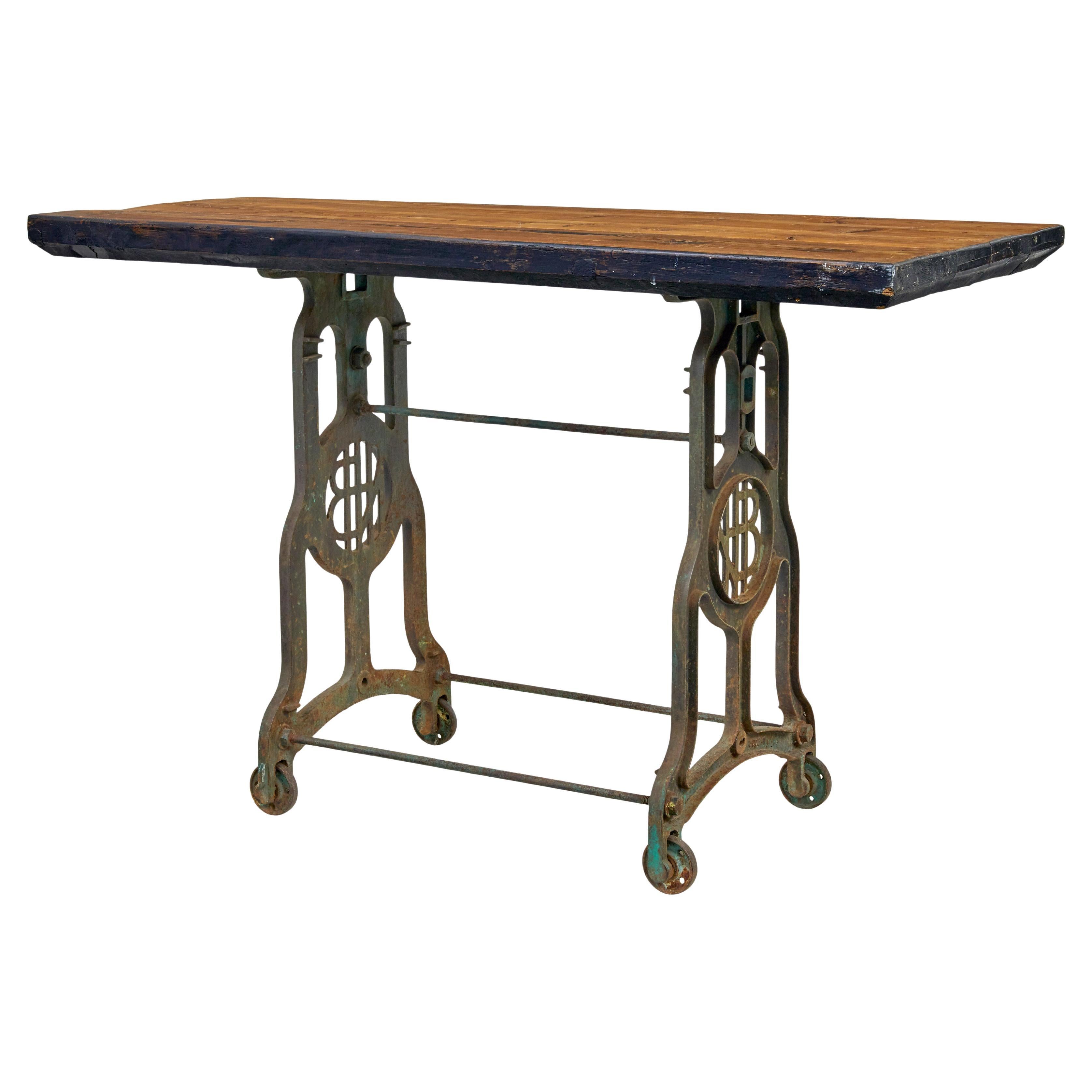 Early 20th century industrial cast iron and pine work table For Sale