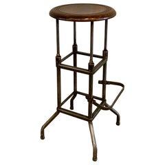 Early 20th Century Industrial Drafting Stool with Footrest