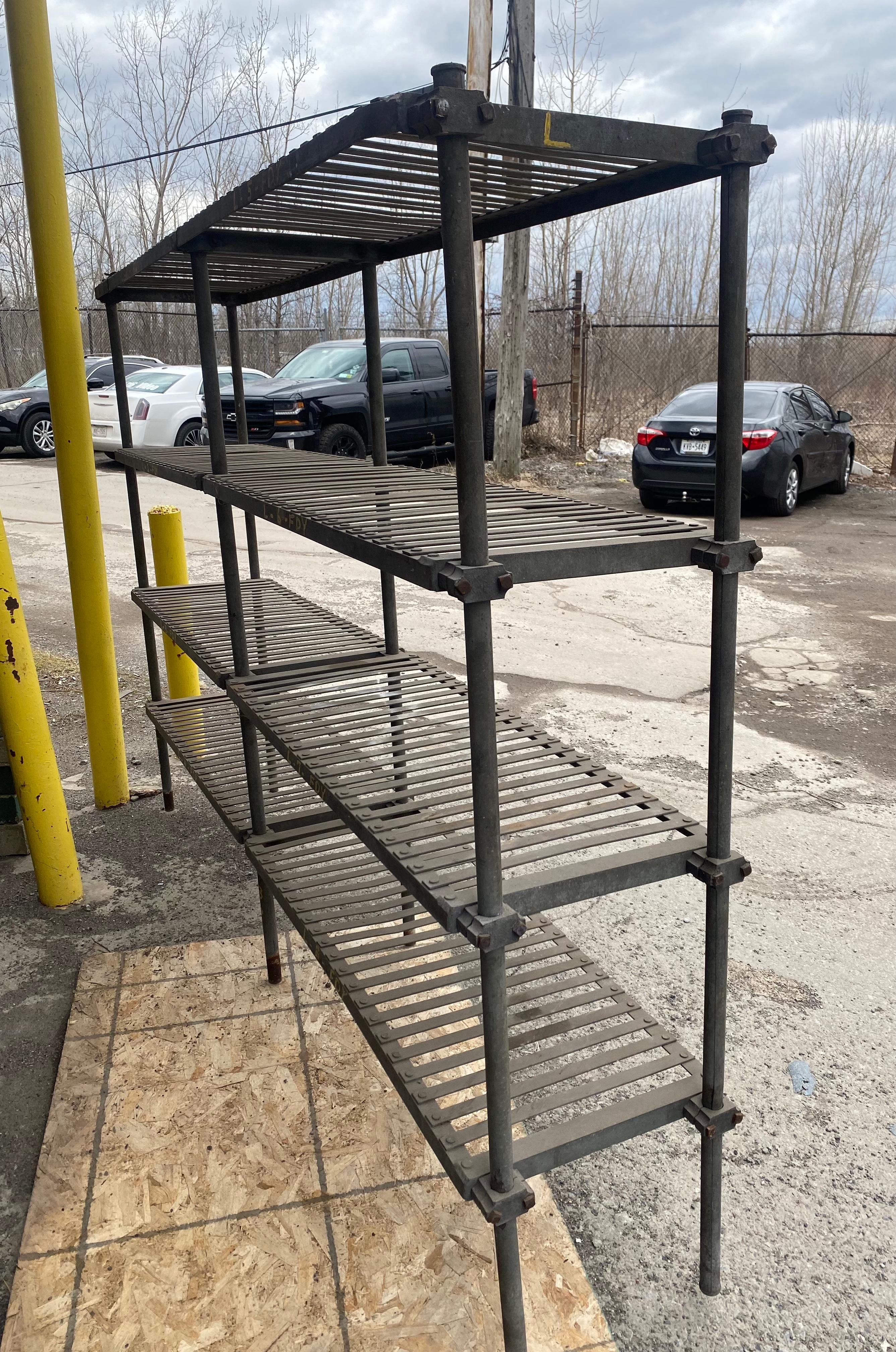 Great old industrial steel shelving / bookcase, salvaged from Buffalo New York factory. Unusual style and design, Heavy duty, very architectural. Hand delivery avail to New York City or anywhere en route from Buffalo NY.