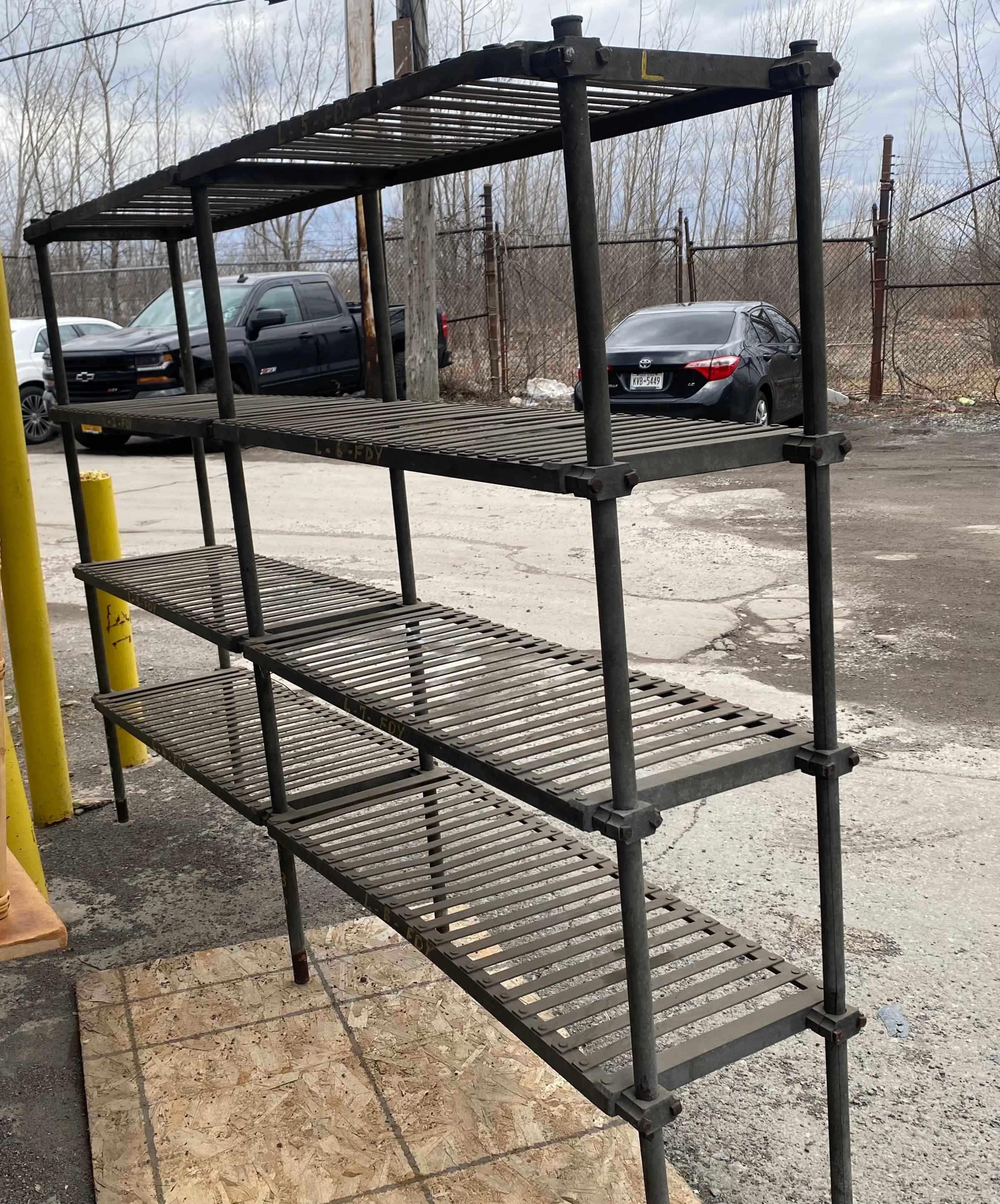 Early 20th Century Industrial Factory Steel Shelving, Four Tier, Architectural In Distressed Condition For Sale In Buffalo, NY