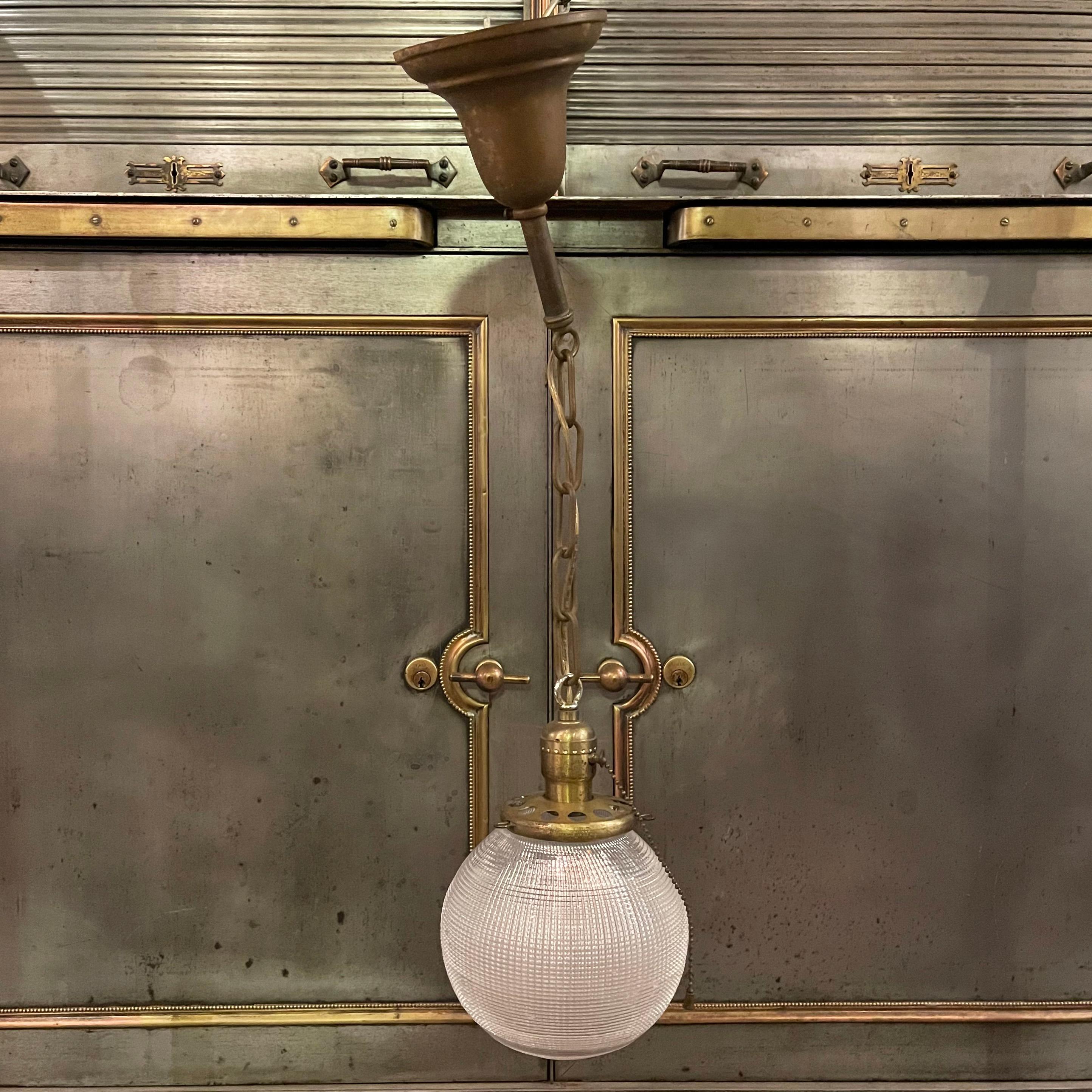 American Early 20th Century Industrial Holophane Glass Globe Pendant Light