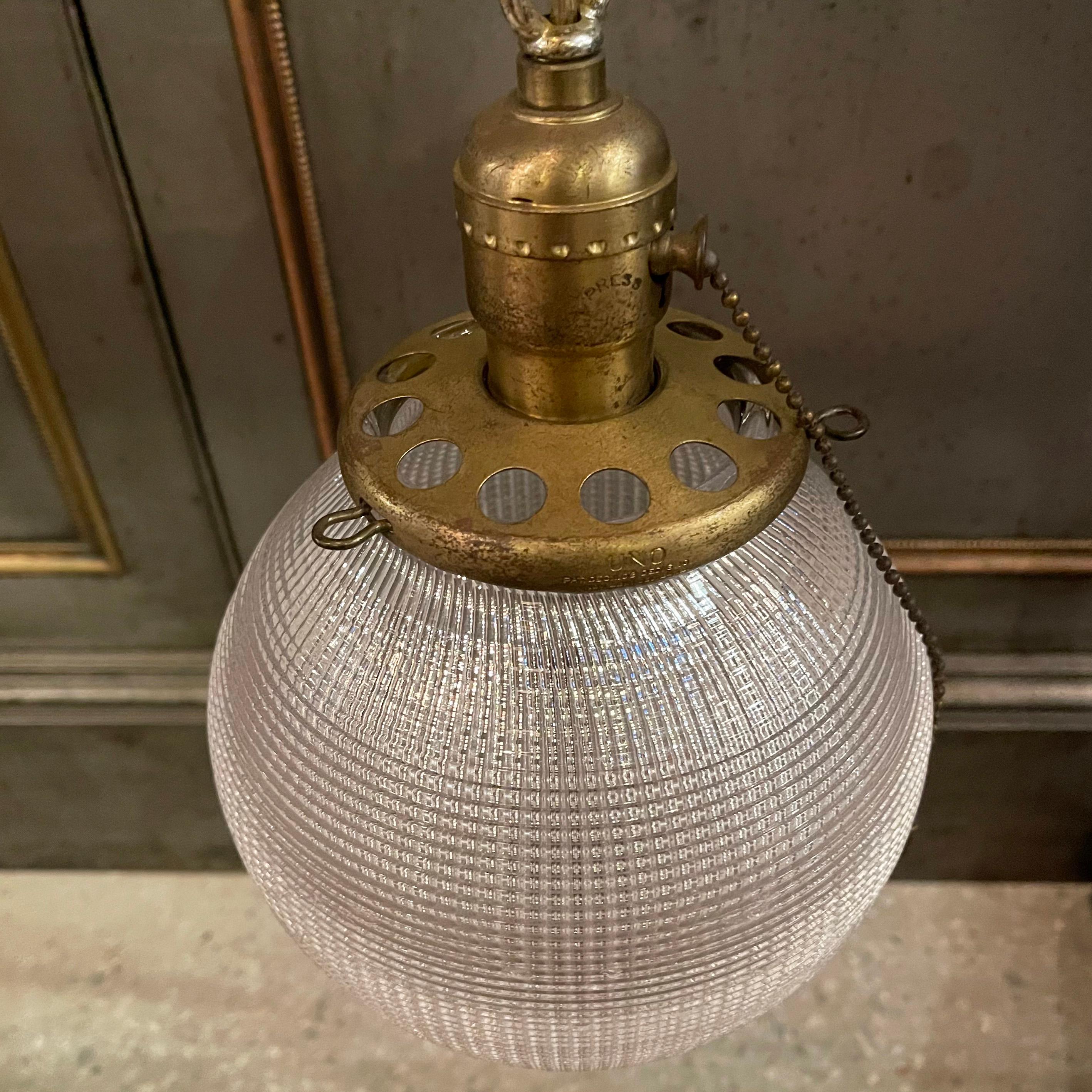 Early 20th Century Industrial Holophane Glass Globe Pendant Light In Good Condition In Brooklyn, NY