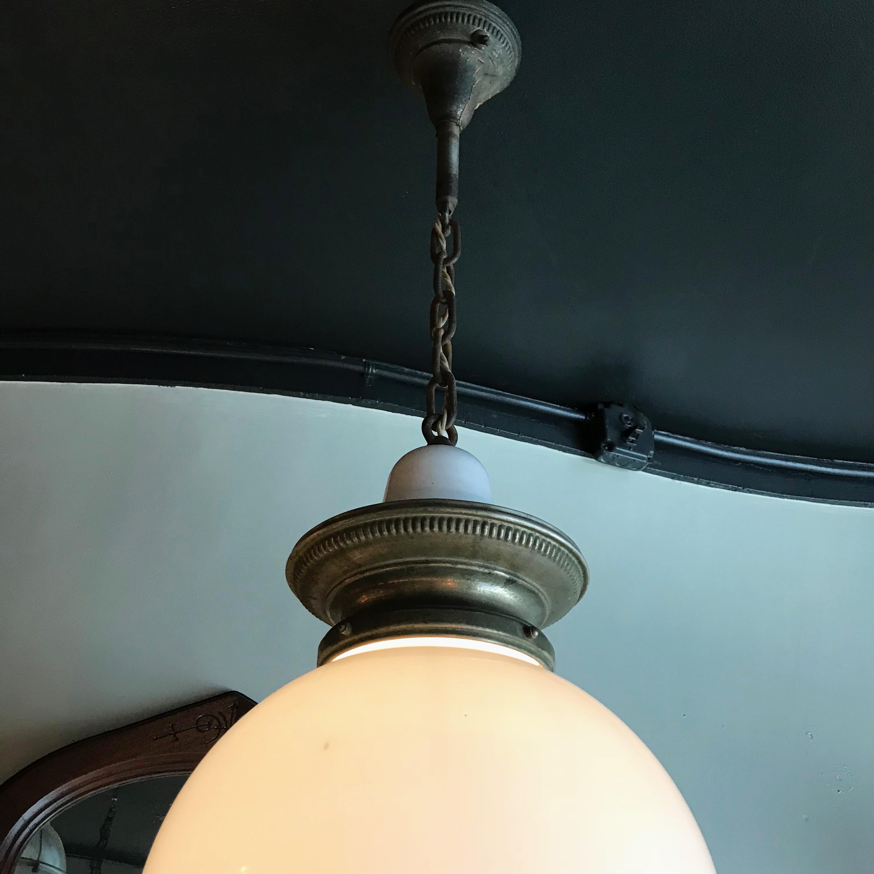 American Early 20th Century Industrial Milk Glass Globe Library Pendant Light