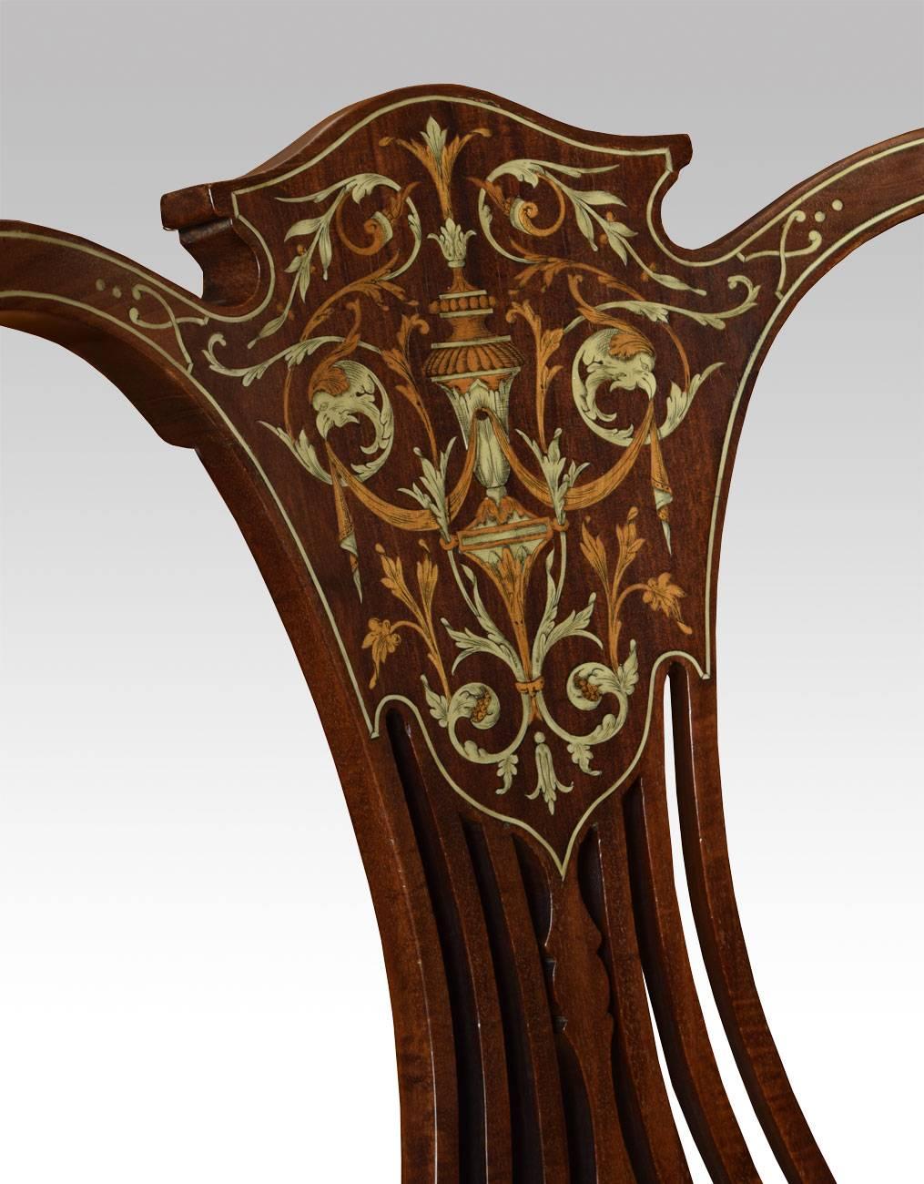 Early 20th century inlaid armchair, having shaped back inlaid with classical foliate scrolls, to the open arms and reupholstered oval seat, raised up on cabriole front legs. 
Dimensions:
Height 33 inches, height to seat 16.5 inches,

width 24