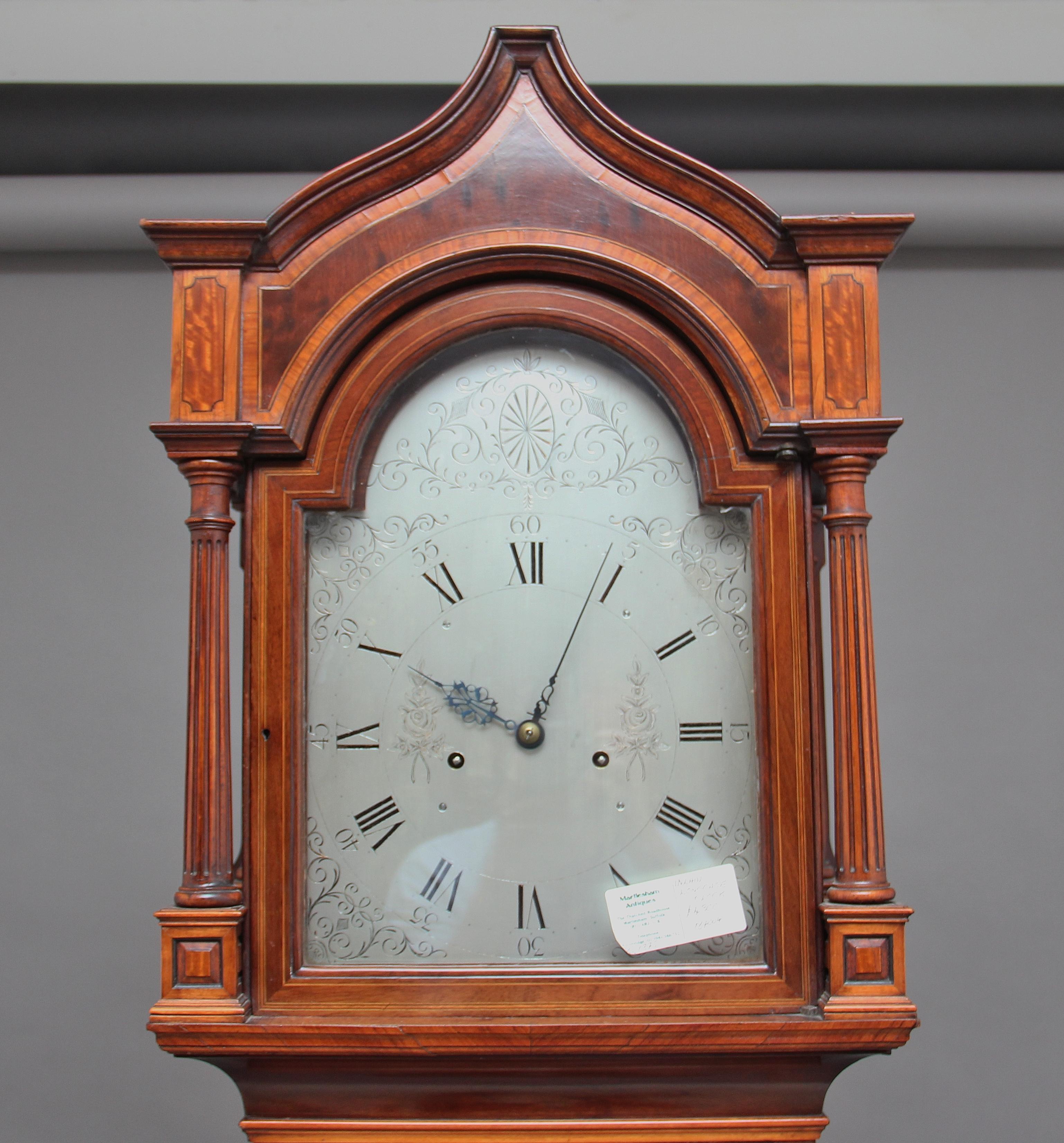 A lovely early 20th century mahogany cased eight day longcase clock, the eight day movement striking the hour on a bell, the case is stunning, a real testament to the cabinet makers skill, it’s inlaid with exotic woods and inlays, standing on ogee